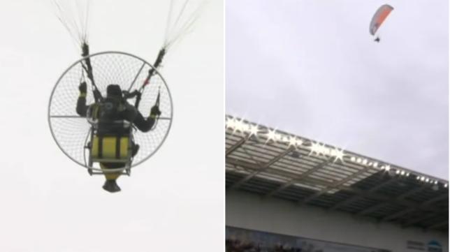 Championship Match Delayed as Mysterious Figure Spotted Soaring Over Stadium